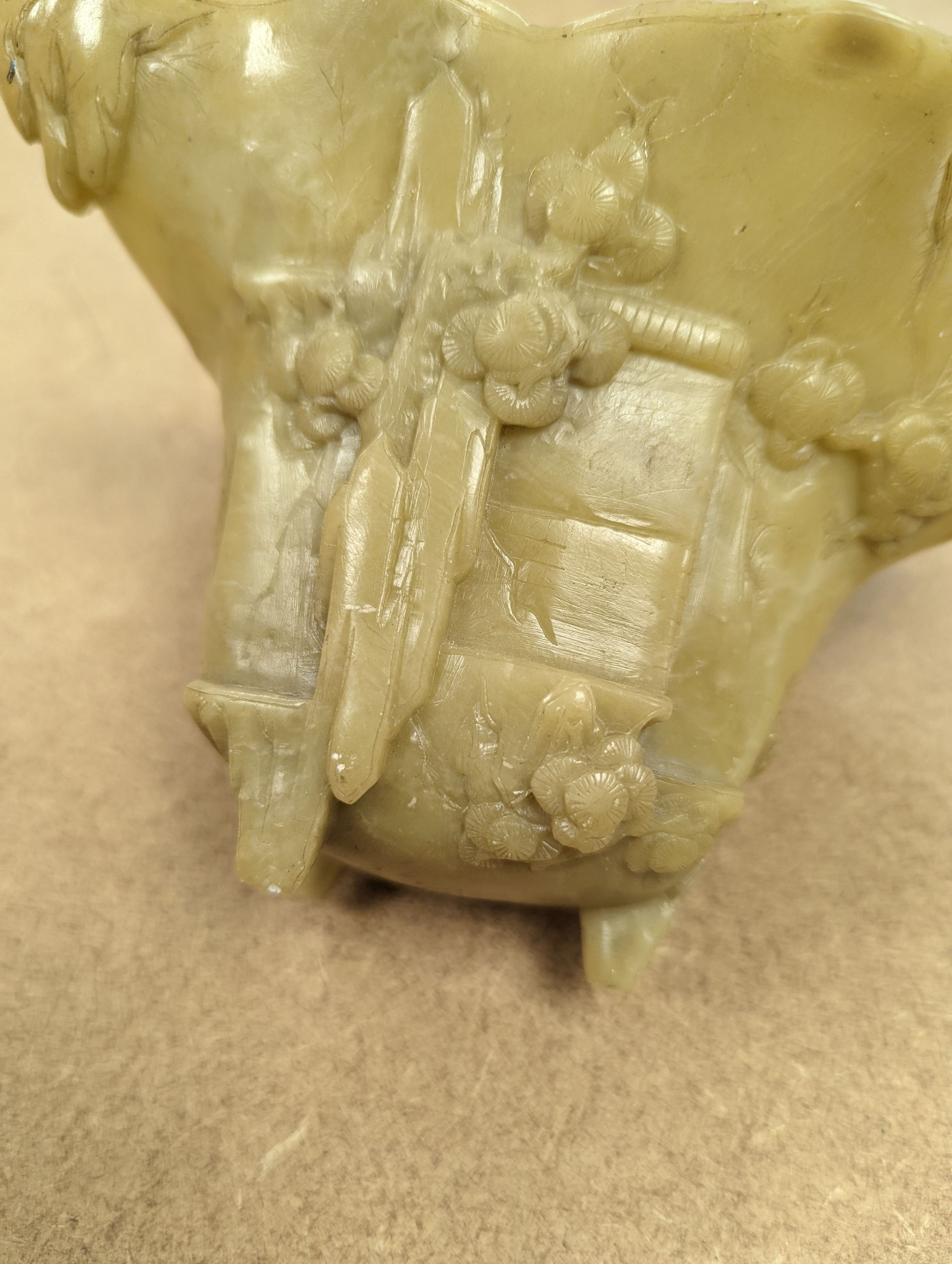 A Chinese carved soapstone libation cup, 19cm